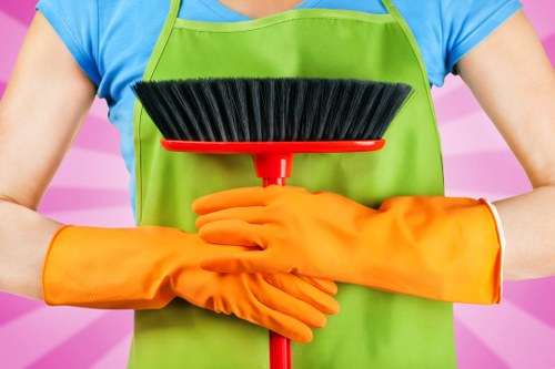 Cleaner preparing linen and bedroom presentation for an Airbnb property in Belgravia